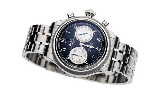 <strong>Ball Watch｜ボール・ウォッチ</strong>　トレインマスター キャノンボール。ブラックのエナメルダイヤルに、繊細なコマの連なりからなるステンレスブレスを装備。12時位置にデイトを装備する点もユニーク。(写真はプロトタイプのため現行商品と異なる場合があります）