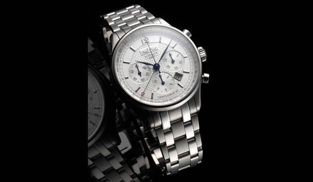 <strong>PaulPicot｜ポール ピコ｜フォトギャラリー</strong>　ポール ピコの代表作「ジェントルマン」に、クロノグラフやGMT機能をマウントしたハイエンド機。ギョーシェ装飾を施したクラシカルなシルバー文字盤に、複雑なメカニズムが見事に融合されている。