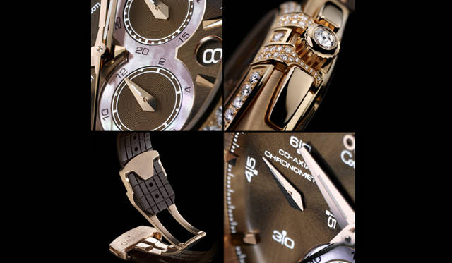  コンステレーションなではの優美な一体型フォルムに、コーアクシャル脱進機を搭載した「オメガ／ダブルイーグル」。2006年にはユニークなダイヤルデザインを持つクロノグラフが登場し、2007年にはレディスモデル（写真）も登場。時カウンターと分カウンターをマザーオブパールで「8の字につなげるほか、コンステレーション特有の“4つ爪”にはダイヤモンドをセッティング。ラバーベルトのバックルには高級革ベルトによく見られるディプロイメント式を採用している。9時位置のスモールセコンドに、コーアクシャル＆クロノメーター表記を記し、高精度をアピールする。