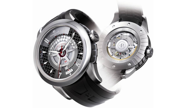 <strong>Perrelet｜ペルレ</strong> チタンケース＆ナチュラルラバーベルトを身にまとい10気圧防水を獲得したペルレ初のスポーティモデル。文字盤には軽量かつ強靭なカーボンファイバーを採用。シースルーバックからは、自社によってブラッシュアップされた自動巻きムーブメントの美しい姿が堪能できる。「ニュー チタニウム コレクション ダブルローター」