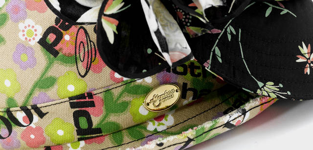 black bag, ¥31,500 and abstract-patterned bag, ¥31,500 both from Salvor.