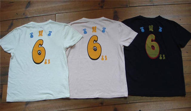 「WOODSTOCK×TMT」T-SHIRT（裏）9240円<br> WOODSTOCK is a registered trademark of UFS, Inc. © 2009 Woodstock Ventures LC