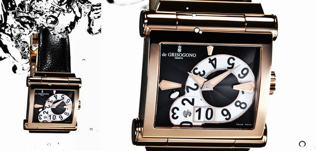 <br />迫力あるスクエアケースはヒンジ状に可動するラグがポイント。また、ビッグデイトの回転ディスクをあえて見せることにより、鮮烈なアクセントをつくりだしている。ケースバックのみならずサイドもシースルー構造。PG ケース×カーフストラップ、自動巻き、39.64×48.3 mm。「グランデ・オープン・デイト」297万1500円（ドゥグリソゴノ ジャパン Tel. 03-6212-8100）