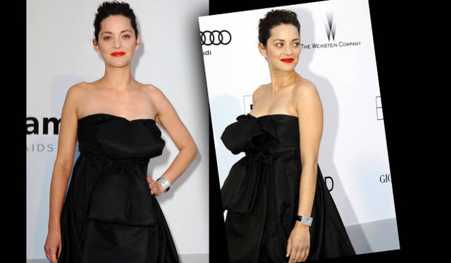 <b>第63回カンヌ国際映画祭｜amfARチャリティー・オークション｜Marion Cotillard</b>　ディオールのブラックドレスに身を包んであらわれたマリオン・コティヤール。ネックレスなどは着けないシンプルなドレススタイルに、ルージュだけひいた潔さはさすが。