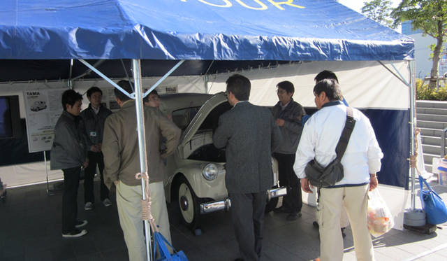 <strong>日産 ザ・ニュー・アクション・ツアー｜NISSAN the new action TOUR</strong>　日産自動車がはじめて開発した電気自動車「たま電気自動車」が展示され、体験試乗も同時におこなわれた。