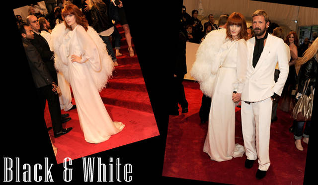 <strong>特集｜セレブリティの最新ドレススタイルをチェック！</strong>　<strong>（左）</strong>「YVES SAINT LAURENT（イヴ・サンローラン）」のクラシックなホワイトシルクのロングドレスに、ホワイトのゴージャスなフェザーコートを合わせた上級者コーディネイトを披露したのはFlorence Welch（フローレンス・ウェルチ）。　<strong>（右）</strong>は「イヴ・サンローラン」クリエイティブ・ディレクター Stefano Pilati（ステファノ・ピラーティ）と。ステファノ・ピラーティはおなじくホワイトシルクのダブルスーツにブラックのスカーフをスタイリング。ニューヨーク・メトロポリタン美術館ファッションインスティテュートガラにて。　©Yves Saint Laurent