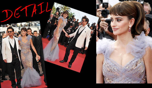 <strong>カンヌ国際映画祭2011</strong>｜Johnny Depp（ジョニー・デップ）にエスコートされながら、レッドカーペットに姿を見せたPenelope Cruz（ペネロペ・クルス）。ヌーディなドレスに差し色として合わせたのは大粒のルビーが揺れるショパールのイヤリング。『パイレーツ・オブ・カリビアン／生命の泉』プレミアにて。　©Getty Images