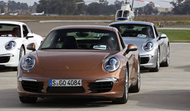 <strong>Porsche 911｜ポルシェ 911</strong><br><br><#IMAGELINK_EX_(auto)_(CT_2_24454_15)_(/article/13226?num=1)_()_(ポルシェ 911特集｜試乗速報─島下泰久篇)#><br><#IMAGELINK_EX_(auto)_(CT_2_24454_16)_(/article/13302?num=1)_()_(ポルシェ 911特集｜試乗速報─渡辺敏史篇)#>