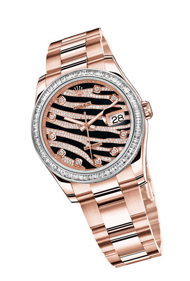 気品と女性らしさが溢れる、「オイスター パーペチュアル デイトジャスト」。エバーローズゴールドにダイヤモンドの優美さと、ロレックスが誇る精度や堅牢さ、信頼性が見事に融合している。<br /><br /><strong>オイスター パーペチュアル デイトジャスト</strong><br />756万円（予価／今夏発売予定）<br />自動巻き、直径36mm、エバーローズゴールドケース、ベゼルは60ポイントのバゲットカットダイヤモンド入り、エッジに120ポイントのブリリアントカットダイヤモンド入り<br /><br />日本ロレックス<br />Tel. 03-3216-5671