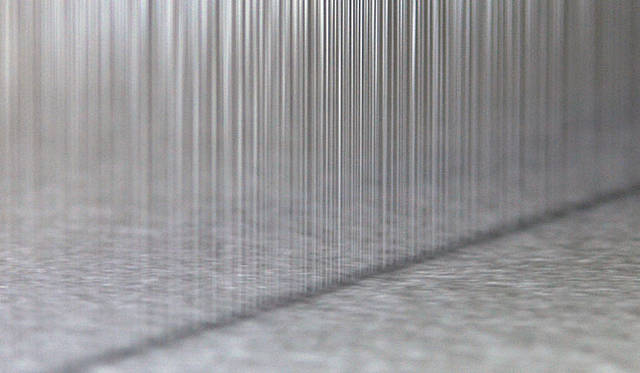 　これが、「スーパーウォータージェット」。水のカーテンでコットンを織り上げる