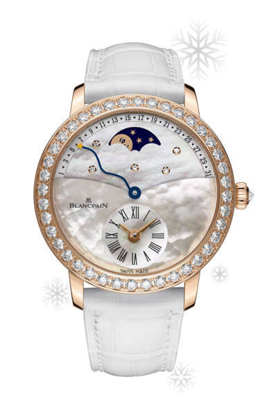 BLANCPAIN｜ブランパン<br /><br />女性らしい美しさと芸術性を兼ね備えた、ブランパンのレトログレード カレンダー。特別なプレゼントにこそ似合う逸品。<br /><br />ウーマン オフセンターアワー レトログレードカレンダー ムーンフェイズ<br />[RG×ダイヤモンド×マザーオブパール]<br />383万2500円<br /><br />ブランパン ブティック銀座<br />Tel. 03-6254-7233