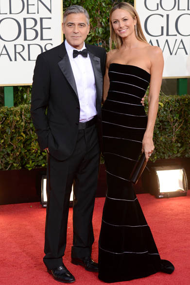 映画『ファミリー・ツリー』で見事、最優秀主演男優賞を獲得したジョージ・クルーニーと、その恋人のステイシー・キーブラー。ジョージ・クルーニーはジョルジオ アルマーニを、ステイシーはジョルジオ アルマーニ プリヴェを選んだ。