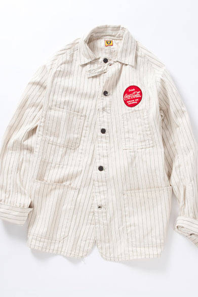 <strong>BEAMS｜ビームス</strong>　「COCA-COLA×HUMAN MADE×BEAMS」コレクション　チンストラップやワッチポケット付きなどのディテールが、戦前のものを意識したデザイン。「Coca-Cola」を輸送する全米の鉄道機関士が着用したイメージで、戦前のワークディテールを備えるカバーオールをチョイス。カバーオールジャケット4万4940円