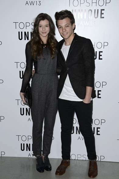 <strong>LOUIS TOMLINSON & ELEANOR CALDER｜ルイ・トムリンソン&エレノア・カルダー</strong><br /><br />トップショップ　ユニーク　コレクションの会場にてワン・ダイレクションのルイ・トムリンソンと彼女のエレノア・カルダー。