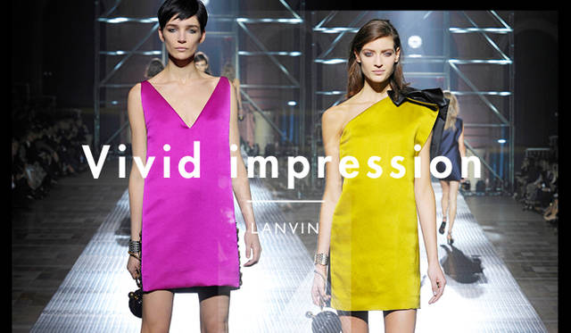 <strong>鮮やかに印象を残すビビッドカラー、今年はさらにネオンカラーが新鮮！</strong><br />大胆なパターンが目立った今シーズンは、カラーパレットも鮮やか。鮮烈なビビッドカラーがトレンドを華やかに彩るなか、とくに注目したいのはエッジの効いたピンク。フェミニンなイメージではなく、クールに着こなすのがポイントだ。また、もっとも今年らしいといえるのがネオンカラーの存在。思い切って全身で、とまでは難しくとも、ポイントで取り入れるだけでもぐっと“今年っぽい”印象に。<br /><br />LANVIN（ランバン）