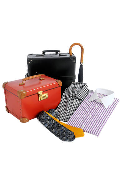 <strong>MEN’S｜メンズ</strong><br /><strong>VULCANIZE LONDON｜ヴァルカナイズ・ロンドン</strong><br />ポップアップショップには、英国が誇る一流ブランドのアイテムが集まる。（左から時計回り）ヴァニティケース9万4500円、トラベルケース17万8500円（GLOBE-TROTTER）、カサ2万8350円（Fox Umbrellas）、ストライプシャツ3万450円、ギンガムチェックシャツ3万3600円、ネクタイ 各1万8900円（TURNBULL & ASSER）