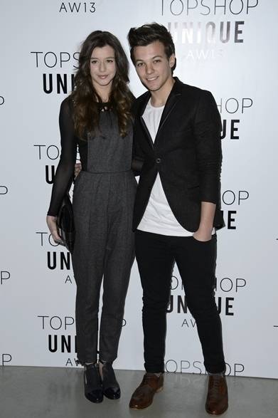 <strong>LOUIS TOMLINSON & ELEANOR CALDER｜ルイ・トムリンソン&エレノア・カルダー</strong><br /><br />トップショップ　ユニーク　コレクションの会場にてワン・ダイレクションのルイ・トムリンソンと彼女のエレノア・カルダー。