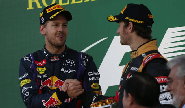 惜しくもレースを3位で終えたロマン・グローシャン（ロータス）。そして鈴鹿ウィナーのセバスチャン・ベッテル（レッドブル）