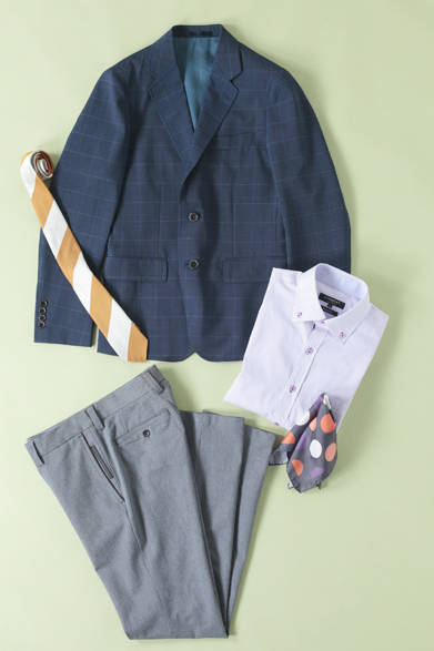 トレンドのウィンドウペンを使用した3ボタン段返りジャケット。背抜きのクールマックス仕様なので、春から夏にかけて長く着用できる。カラーはネイビーとチャコールの2色展開。クールマックスウィンドペンジャケット3万1500円、シャツ1万2600円、パンツ1万3650円、ネクタイ8925円、ポケットチーフ4830円（すべて阪急メンズ限定）（ヴォウェル／阪急メンズ東京7階）