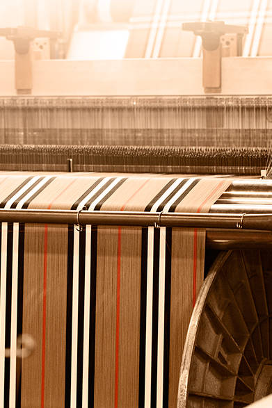 1920年代、トレンチコートの裏地に使用された「バーバリーチェック」