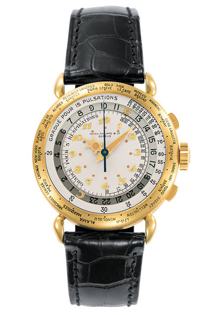 1940年発表<br /> ワールドタイム Ref.1415-1HU<br /> イエローゴールド<br />