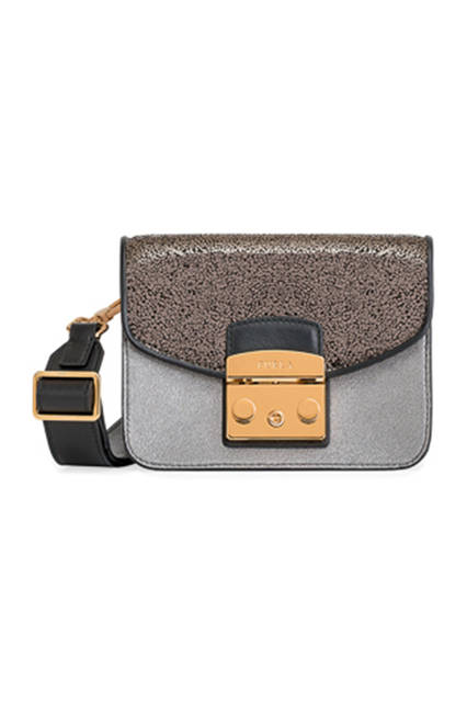 <strong>METROPOLIS</strong><br /> W16.5 x H12 x D8cm <br /> 素材｜ゴートレザー<br /> 価格｜5万2000円(税抜)