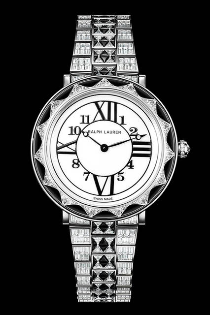 <strong>RL888 DECO DIAMOND デコダイヤモンド　38MM モデル</strong><br /> ムーブメント｜クオーツ<br /> ケース素材｜18Kホワイトゴールド<br /> ケースサイズ｜38mm径、厚さ6.46mm<br /> リューズ｜18Kホワイトゴールド、ダイヤモンド付き<br /> ブレスレット｜18Kホワイトゴールド、ダイヤモンドとブラックスピネルをセットした6つのアジャスタブルリンク<br /> 宝石｜推定17.31カラット。バゲットカットダイヤモンド414個、バゲットカットブラックスピネル159個、ダイヤモンド13個、ローズカットダイヤモンド1個<br /> 防水｜3気圧<br /> 価格｜USD888,000<br />