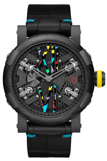 <strong>スチームパンク 46 オート カモ ポップ</strong><br /> <br /> 人類史上最大の発明と言われる蒸気機関を文字盤に讃えるシリーズ。ローマ数字のカモフラージュ柄は、スイスの著名な職人によるハンドペイント。<br /> <br /> Ref.｜RJ.T.AU.SP.007.03<br /> キャリバー｜自動巻き。RJ003-A<br /> パワーリザーブ｜最大40時間<br /> ケース素材｜ブラックPVD加工のSS。ケースバックにプロペラのエングレーブ<br /> ケース径｜46mm<br /> ベゼル｜手作業によるサテンブラシ仕上げとガンメタルカラーPVD加工のSS<br /> ストラップ｜ブラックアリゲーター<br /> 防水｜3気圧防水<br /> 限定数｜25本（生産限定）<br /> 価格｜151万円（税別）<br />