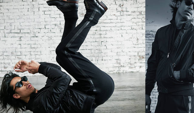 「MA-1風ショートブルゾンに、側章の入ったジャージーパンツとブーツを合わせた、こちらも全身真っ黒のコーディネート。スポーティでありながらドレスの雰囲気を兼ね備えたスタイルです」<br>アウター 12万円、ボトムス 22万8000円（ともにラルフ ローレン パープルレーベル）その他私物