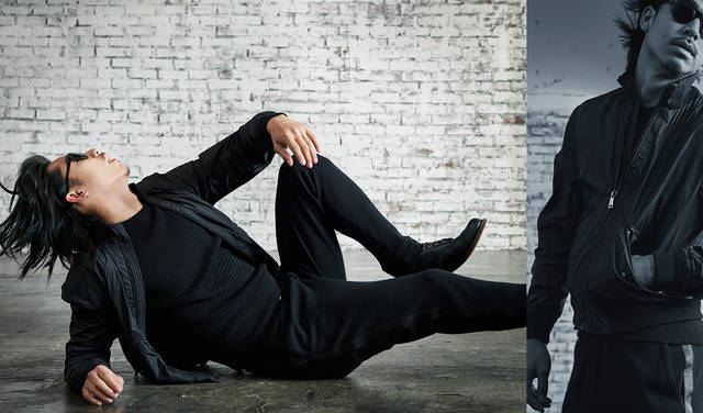 「MA-1風ショートブルゾンに、側章の入ったジャージーパンツとブーツを合わせた、こちらも全身真っ黒のコーディネート。スポーティでありながらドレスの雰囲気を兼ね備えたスタイルです」<br>アウター 12万円、ボトムス 22万8000円（ともにラルフ ローレン パープルレーベル）その他私物