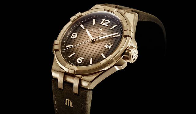 <strong>アイコンブロンズ</strong><br>Ref.｜AI1028-BRZ01-720-1、ムーブメント｜クォーツ、ケース素材｜ブロンズ（銅）、ケースバック素材｜SS、ケース径｜44mm、風防｜サファイアガラス+内側無反射コーティング、文字盤｜ギヨシェ彫りが施されたスレートカラーストラップ素材｜ヴィンテージカーフ、防水｜10気圧、価格｜15万5000円（税別）限定数｜388本