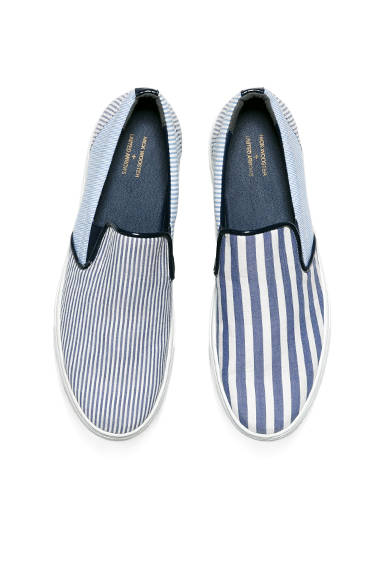 <strong>NICK WOOSTER ＋ UNITED ARROWS</strong><br />左右異なる柄の使い方が新鮮なスニーカー。1万9440円