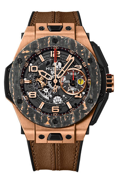 <strong>ビッグ・バン フェラーリ カーボン キングゴールド</strong><br><br> ケース｜18Kキングゴールド(マイクロブラスト加工)<br>ベゼル｜カーボンファーバー×キングゴールド<br />直径｜45mm<br>ムーブメント｜自動巻き（Cal.HUB1241 Unico）<br>機能｜フライバッククロノグラフ（60分積算計）、日付表示<br>ストラップ｜ブラウンスケドーニレザー＋ブラックラバー（取り替え用アルカンターストラップ付属）<br> 防水｜10気圧<br> 限定数｜世界500本<br>発売時期｜7月予定<br>予価｜456万8400円