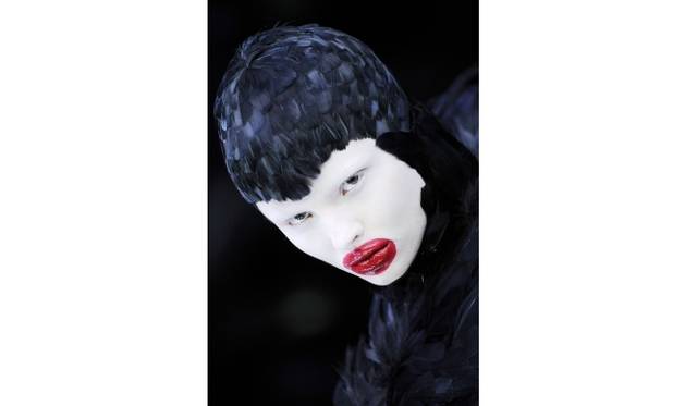 Duck feather dress Artist: Alexander McQueen Date: The Horn of Plenty, A/W 2009-10 Credit line: Model: Magdalena Frackowiak represented by dna model management New York, Image: firstVIEW