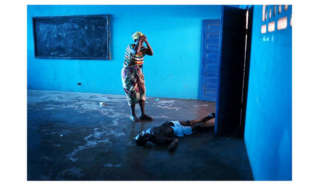 『ソニーワールドフォトグラフィーアワード2015フォトグラファー・オブ・ザ・イヤー　（プロフェッショナル部門）受賞。“Current Affairs” John Moore 　© John Moore, courtesy of Sony World Photography Awards 2015