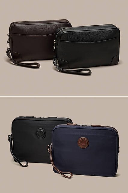 上／スペイン産フルグレインカーフスキンの自然なうつくしさを引き立てるため、クロムなめしを採用したレザーのクラッチ。下／軽量なナイロンを使い、パイピングなどのディテールにカウハイドレザーを配したバッグはカジュアルにもマッチするデザイン。<br><br>上:バッグ[W27×H17×D5cm]各12万960円、下:バッグ[W27×H20.5×D4cm]各4万3200円／ダンヒル ＜阪急メンズ大阪3階・阪急メンズ東京1・3階＞